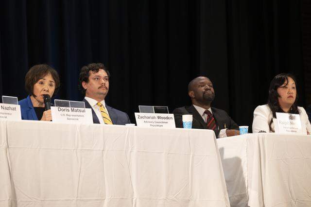 U.S. Rep. Doris Matsui, left, speaks during a congressional candidate forum for CA District 7 at Coloma Center in Sacramento on Thursday, April 2, 2026, as candidates, from left,  Zachariah Wooden, Ralph Nwobi and Mai Vang listen.